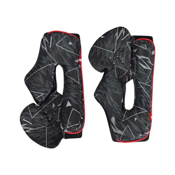A pair of black motorcycle helmet cheek pads with geometric patterns and red accents. The pads have a textured surface and are designed to fit inside a helmet for added comfort and protection.