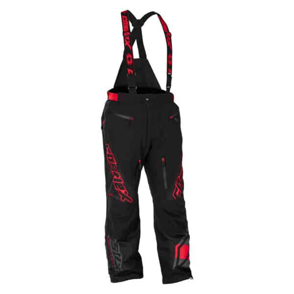 The Men's Vapor Pant features black fabric with red FXR branding on the legs and suspenders, attached suspenders, multiple zippered pockets, and is designed to be waterproof and insulated for cold-weather use.