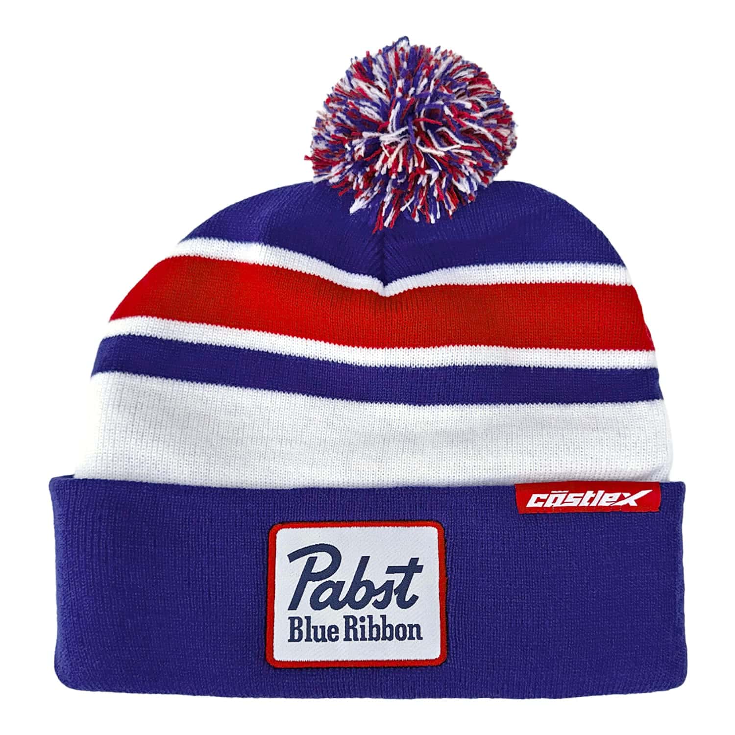 A blue, white, and red beanie with a pom-pom on top, featuring a “Pabst Blue Ribbon” patch and a small “castles” logo on the cuff.