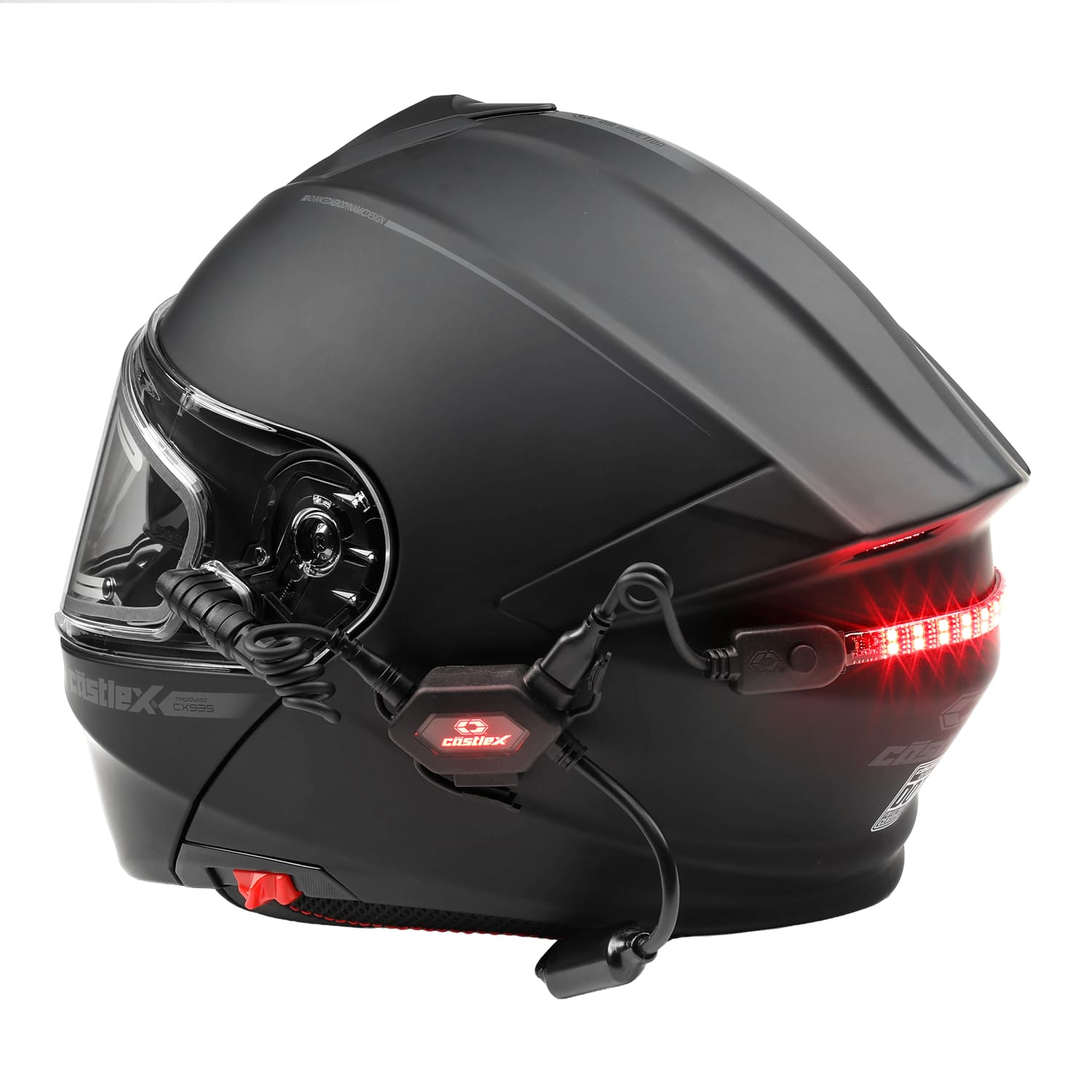 The Illuminator V2 LED Helmet Light Kit is shown installed on a matte black motorcycle helmet with a clear visor, wired communication device, and a red LED safety light strip on the back, displayed from a side angle against a white background.